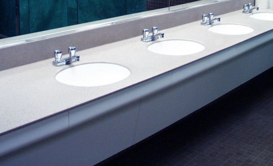 commercial bathroom sink with nice faucet