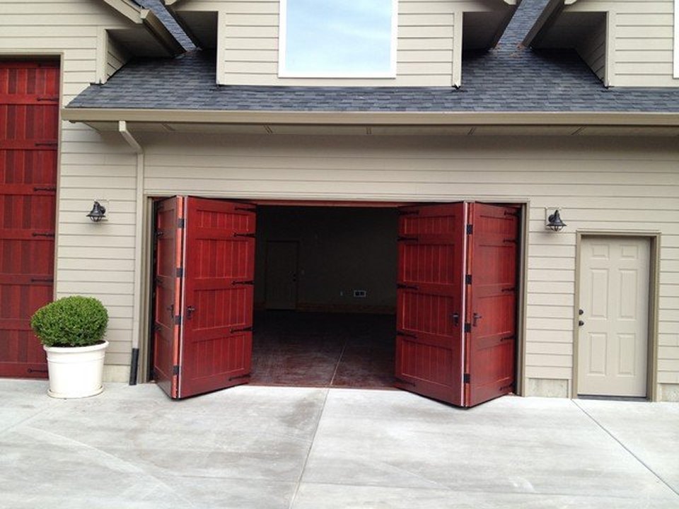 Home Folding Garage Doors Amazing On Home In Bi Fold Door Non Warping Patented Honeycomb Panels And 0 Folding Garage Doors
